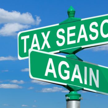 Green street signs against a blue sky with white clouds. One sign reads "TAX SEASON," and the other sign, hinting at a necessary tax review, reads "AGAIN.