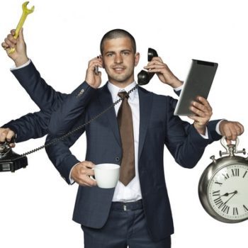 A man in a business suit is shown with multiple arms, holding various items: a wrench, two telephones, a tablet, a clock, and a cup of coffee. The image suggests multitasking and managing numerous responsibilities simultaneously to achieve personal wealth.