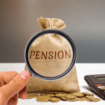 A hand holding a magnifying glass focuses on a burlap sack labeled "PENSION." The sack is placed on a table with scattered coins in front of it. A calculator is visible in the background.