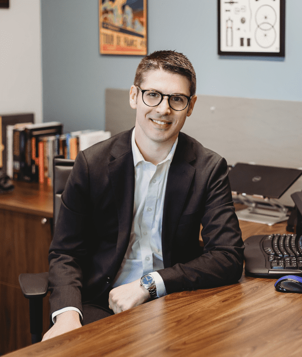 Derek Weed at desk