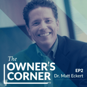Image of a smiling man wearing a dark suit jacket with a collared shirt underneath. The text overlay reads, "The Owner's Corner EP2 Dr. Matt Eckert." The background is blurred with blue and green diagonal lines intersecting the image.