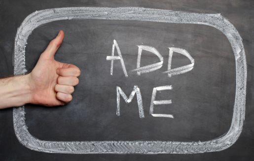 a blackboard that says in chalk "Add me" with a woman's thumbs up